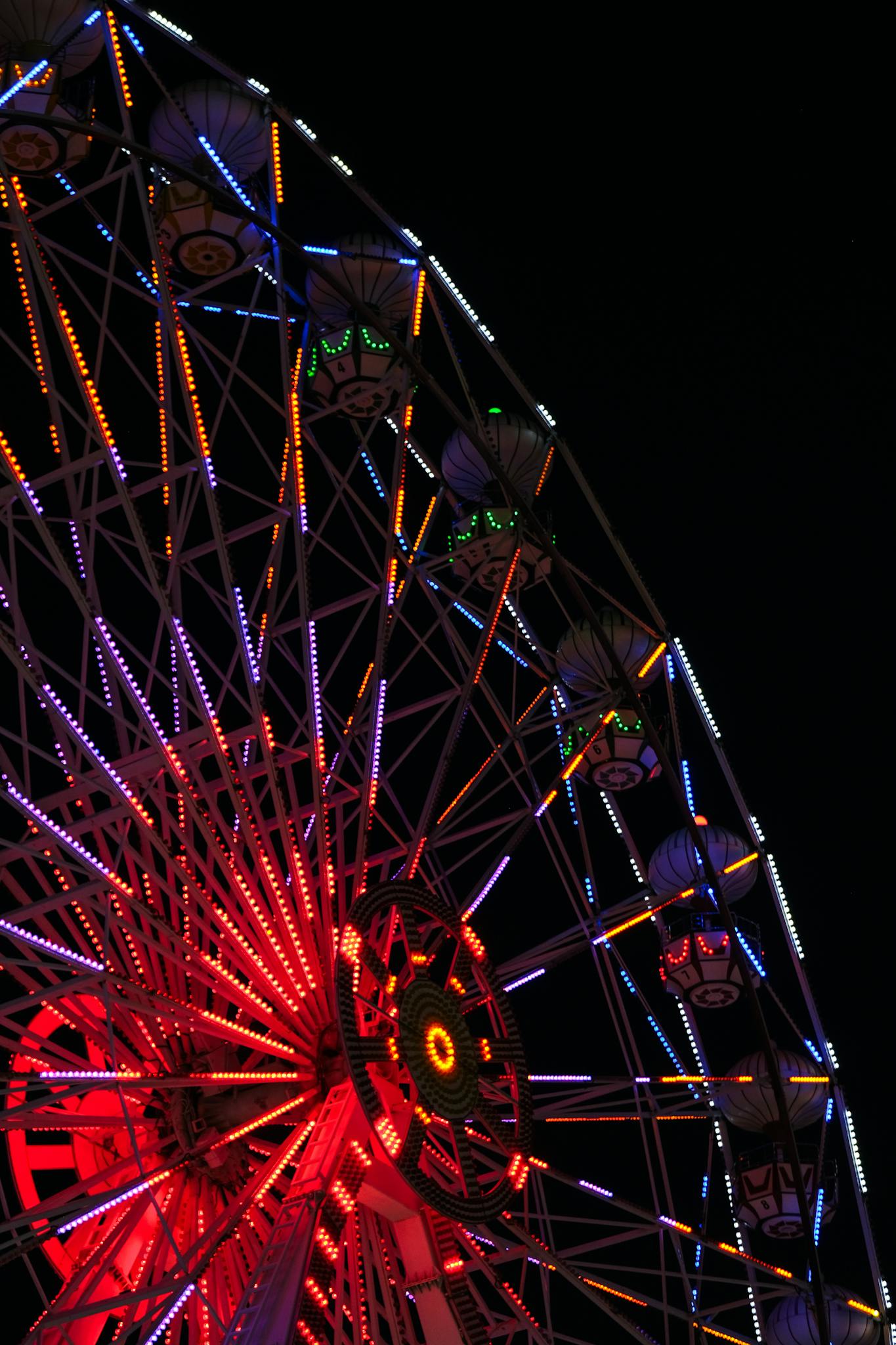 Colorful Ferris Wheel Illuminated at Night